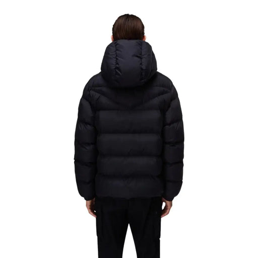 Black puffer jacket with hood and quilted design, likely made of synthetic down material.
