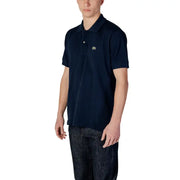 Navy blue Lacoste polo shirt featuring a small green crocodile logo on the left chest, made of breathable cotton