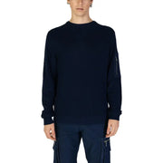 Navy blue long sleeved ribbed knit sweater with zippered pocket on the left sleeve for casual wear
