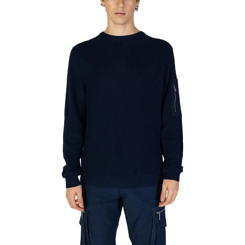 Navy blue long sleeved ribbed knit sweater with zippered pocket on the left sleeve for casual wear