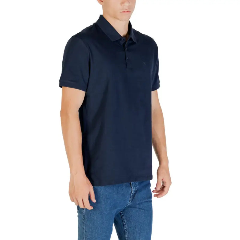 Navy blue short-sleeved polo shirt with classic collar and subtle embroidered logo on the chest for casual wear