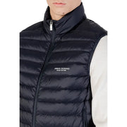 Black quilted puffer vest with high collar front zipper and armani exchange logo embroidered on chest in navy blue product listing
