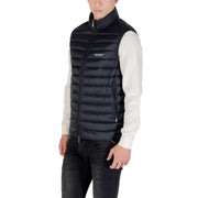 Navy blue puffer vest with black quilted high collar front zipper and subtle chest branding in durable material