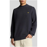 Navy blue ribbed knit sweater featuring a yellow bird logo on the chest made from soft material