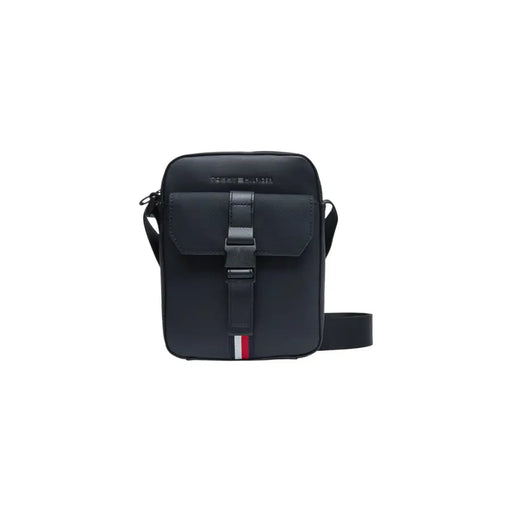Navy blue Tommy Hilfiger crossbody bag displayed in the product listing