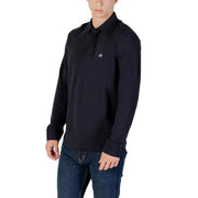 Black long-sleeved polo shirt with subtle white logo on the chest suitable for casual and professional wear