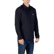 Black long sleeved polo shirt with a subtle white aix logo on the chest in a navy long sleeved polo shirt product image