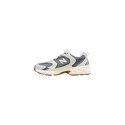 New Balance grey suede slip-on sneakers for women with cream midsole