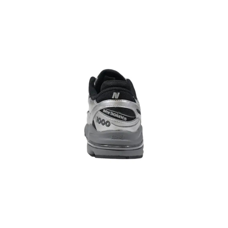 New balance m1000egr black and silver slip on sneaker with sleek retro design for men spring summer use