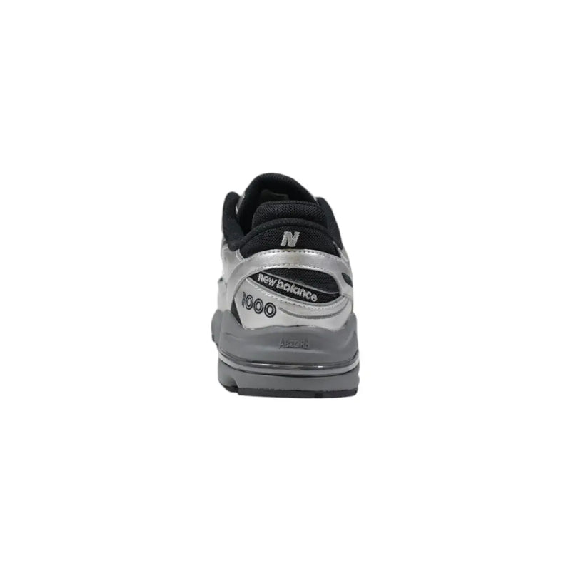 New balance m1000egr black and silver slip on sneaker with sleek retro design for men spring summer use