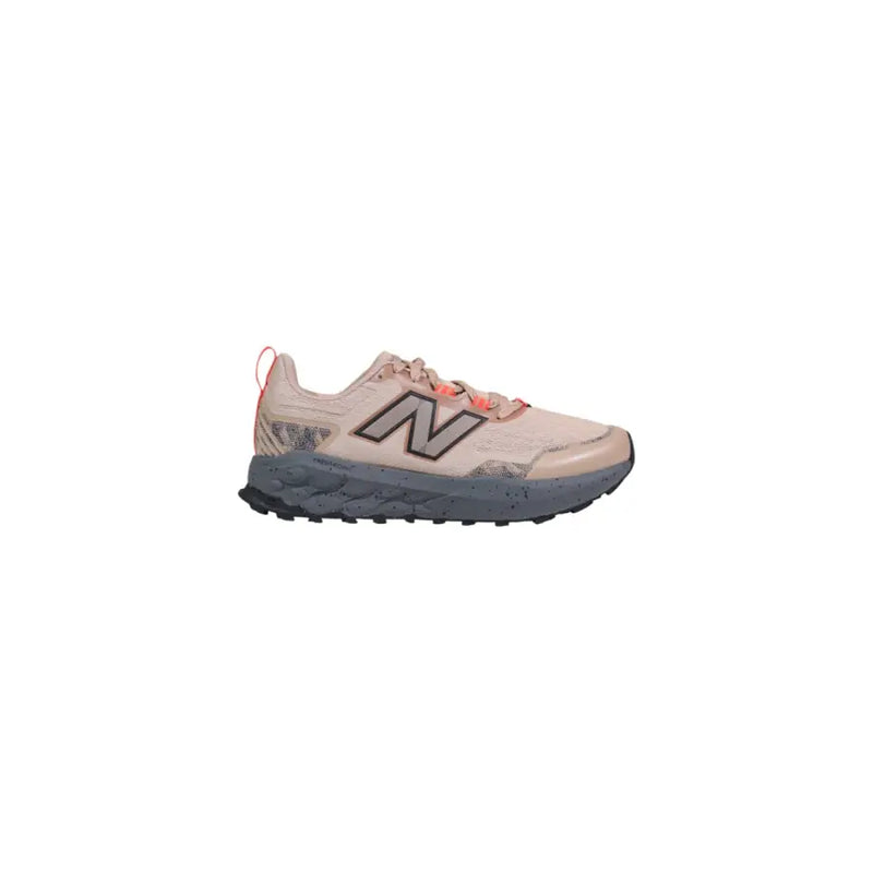 New balance pink and gray trail running shoe with floral accents.