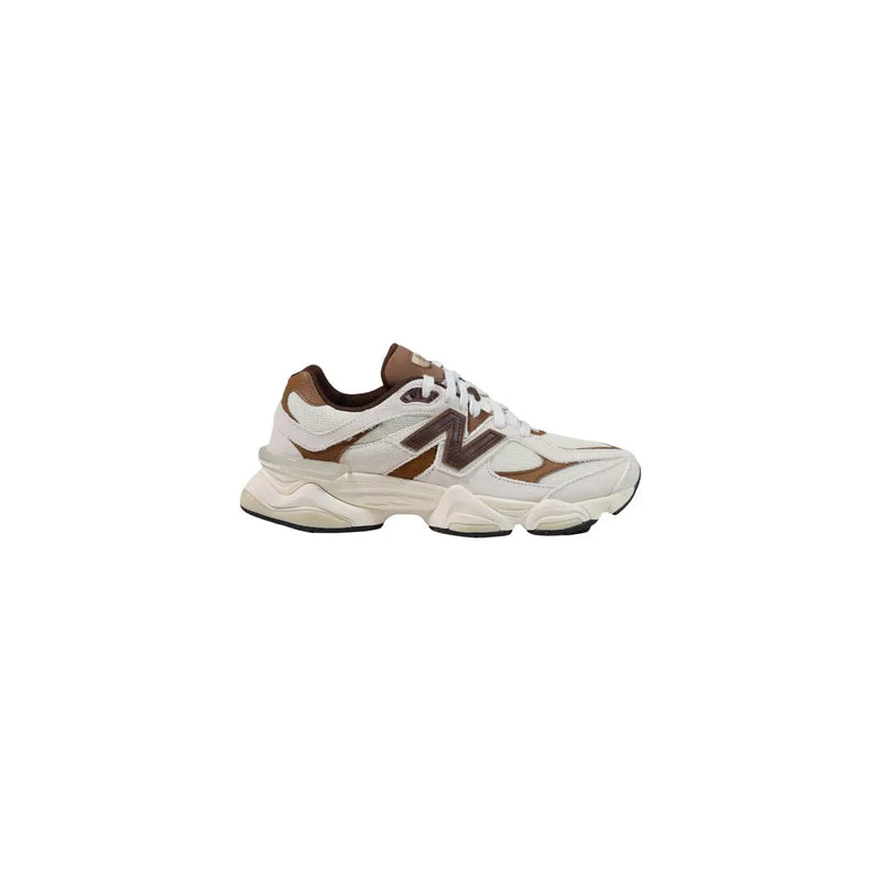 New balance men brown suede sneakers with white accents and chunky sole design for casual wear