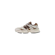 New Balance men brown suede sneakers featuring cream and brown colors with a chunky layered sole design