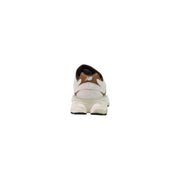 New Balance men brown suede sneakers with white and brown upper and chunky sole for casual wear