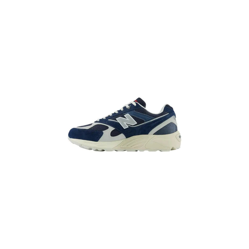 New Balance men grey leather suede sneakers in navy blue and white with suede mesh upper and cream rubber sole