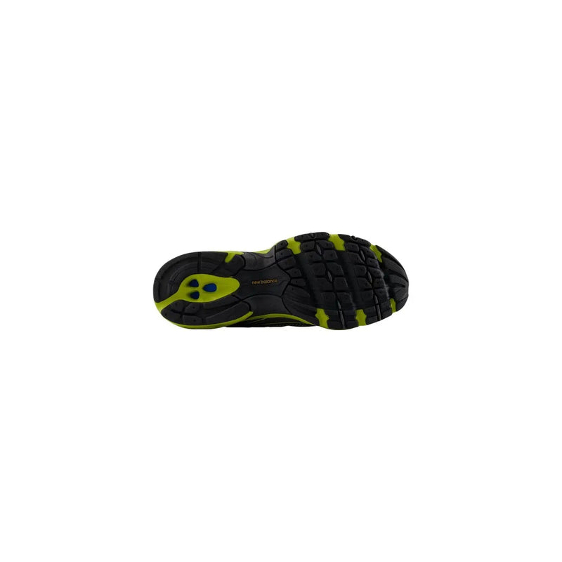 New Balance Baskets pour homme en matière synthétique noire avec des accents vert fluo et une semelle en caoutchouc texturée pour une utilisation sportive