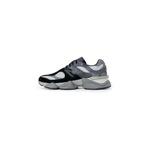 New Balance men sneakers grey rubber sole with black and gray upper and chunky layered sole design