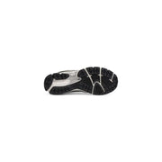 Black and silver asics gel-nimbus 23 running shoe with textured rubber outsole shown with white leather new balance men sneakers size 3.5