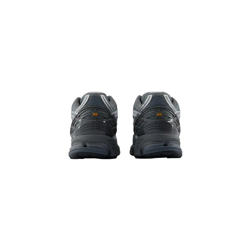 New Balance Baskets synthétiques pour homme grises à motif géométrique, tige en mesh texturé noir et gris et semelle extérieure en caoutchouc