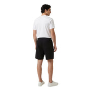Black tailored shorts with a clean minimalist design featured in new balance men t-shirt product collection