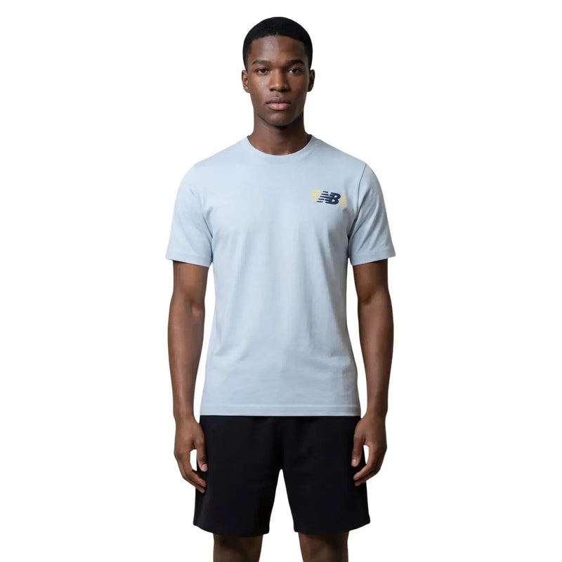 New balance men t-shirt in light blue featuring a crew neck and small logo on the left chest