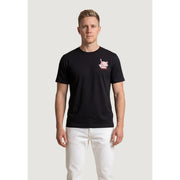 New Balance men t-shirt in black with short sleeves and a small pink and white graphic on the left chest