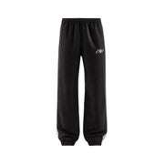 New Balance men trousers black polyester joggers with white side stripes and subtle logo for fall winter wear