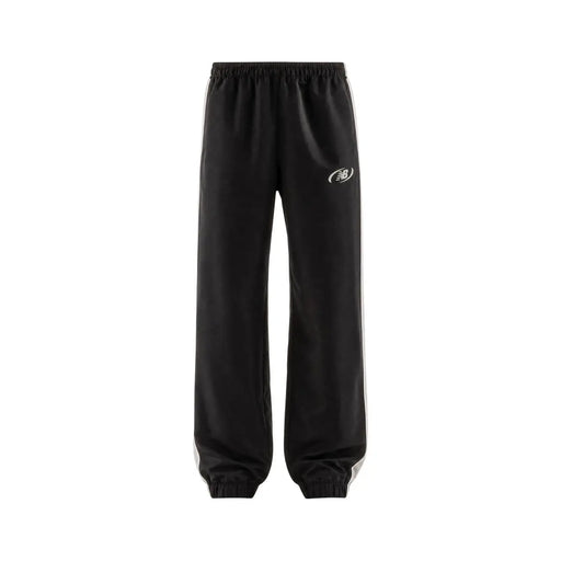 New Balance men trousers black polyester joggers with white side stripes and subtle logo for fall winter wear