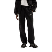 New Balance men trousers black polyester fall winter joggers with subtle white logo and gray trim at the cuffs