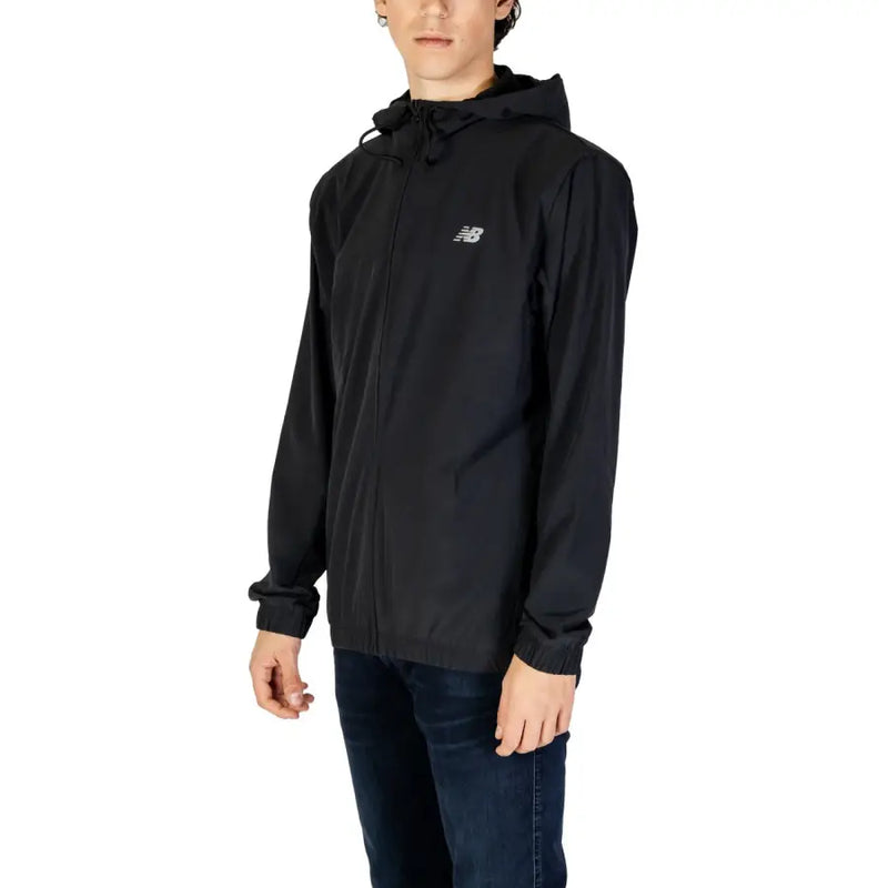Black hooded windbreaker jacket with chest logo from New Balance Mens Long Zip Winter Blazer