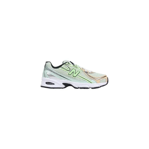 Green and white new balance running shoe with mesh upper, rubber sole, and black accents.