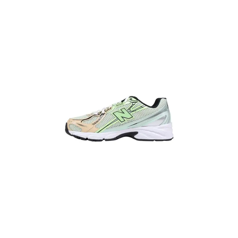 Green and white new balance running shoe with mesh upper, rubber sole.