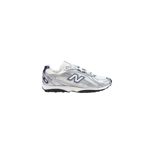 New Balance Baskets de course bleues pour femmes, en matière synthétique, avec tige en mesh argenté et blanc et détails bleu marine.