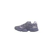 New Balance women grey suede sneakers featuring gray 990v5 with chunky layered sole and subtle metallic accents