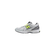 New Balance women grey synthetic sneakers featuring silver and neon green mesh upper and textured rubber sole