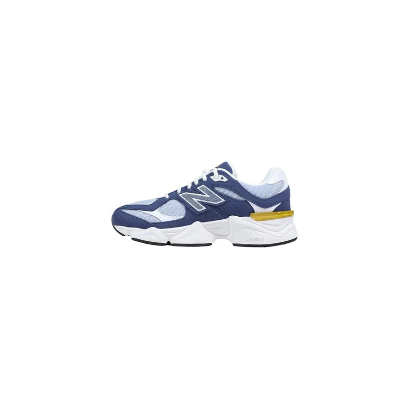 New Balance women purple suede sneakers with navy blue white 990v3 design and bold yellow heel accent seen from back