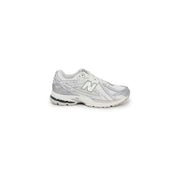New Balance women silver sneakers fabric size 3 with white and silver mesh upper and rubber sole