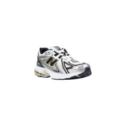 New Balance women silver synthetic sneakers with white and silver design, black accents, and gold-trimmed logo