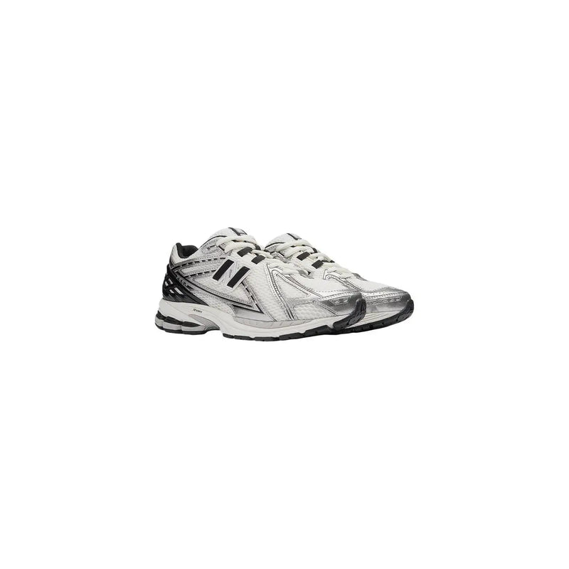 New balance women silver textile slip on skate sneakers with sleek reflective upper and black mesh detailing