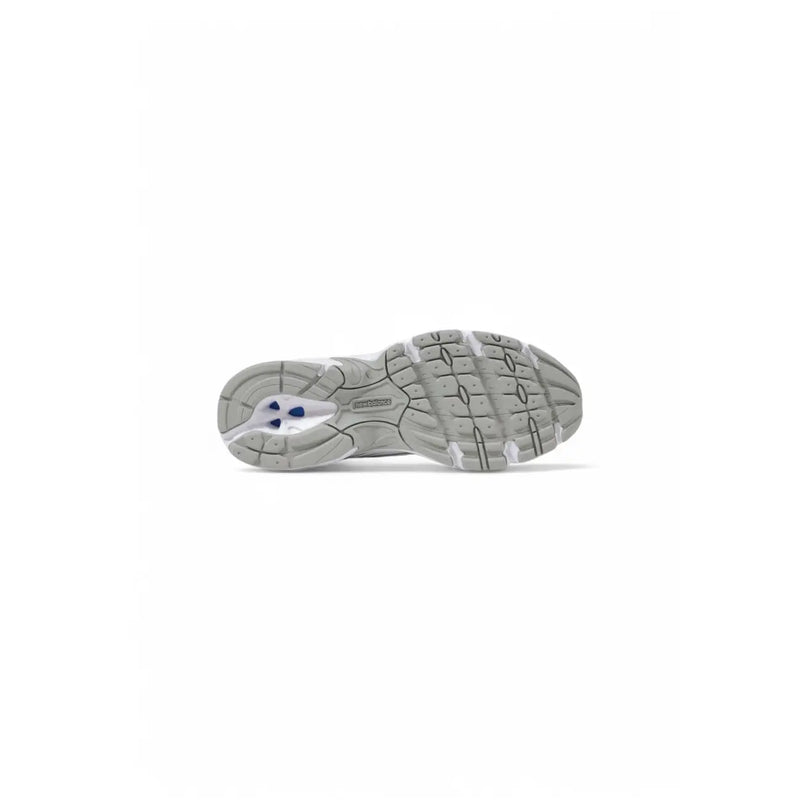 Gray and white textured sole of new balance women white faux leather sport sneakers shown from the back side