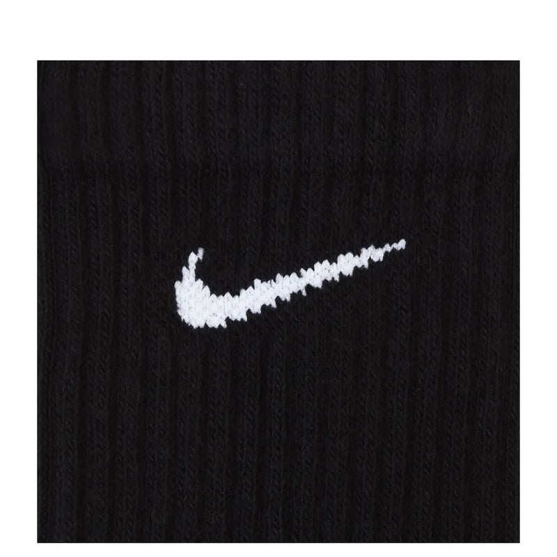 Black Nike men’s cotton blend sock with white embroidered swoosh logo suitable for fall and winter wear