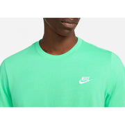 Nike men’s green short sleeve cotton t-shirt featuring a bright green color and white logo on the chest