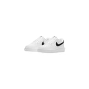 Nike women leather sneakers white Air Force 1 low with black swooshes and perforated leather uppers