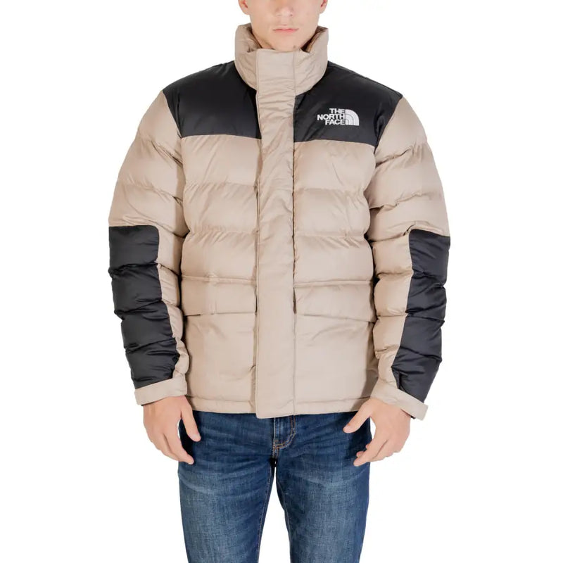 Beige and black puffer jacket with the north face logo.