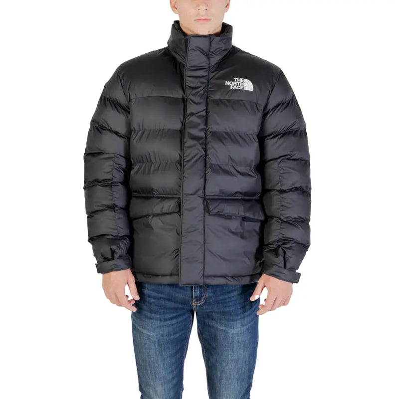 Black puffer jacket with hood and logo on chest, made of synthetic material.