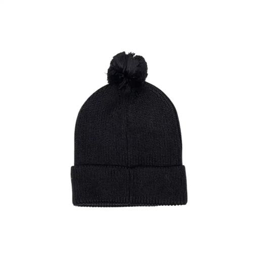 Black knit beanie with pom-pom, unbranded.