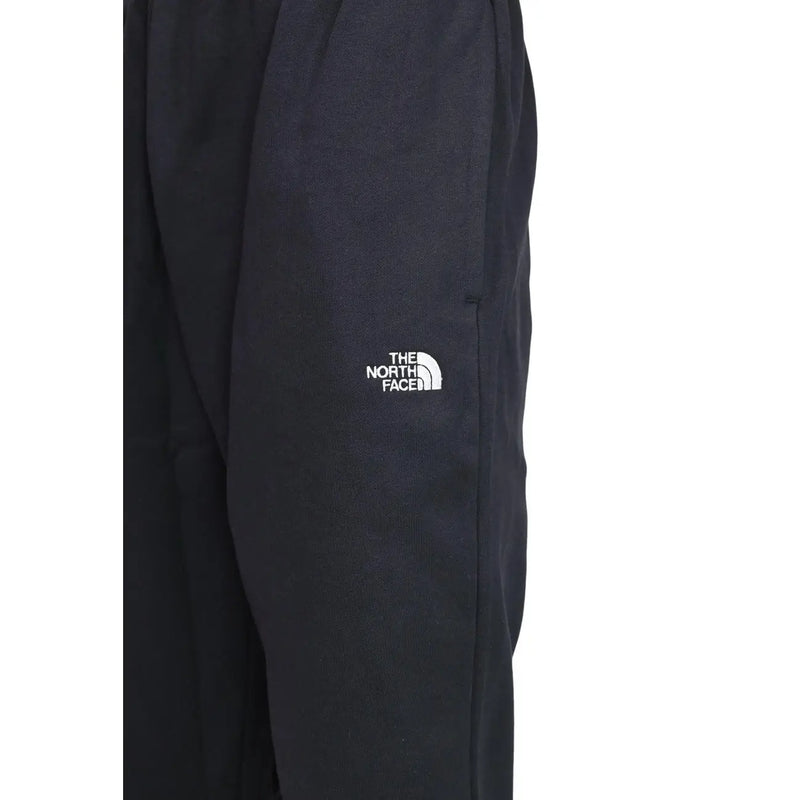 The north face men black cotton fleece jogger trousers featuring white embroidered logo on the thigh