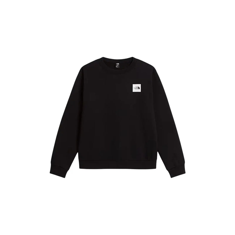 Schwarzes Herren-Sweatshirt von The North Face aus Baumwolle mit normaler Passform, langen Ärmeln und kleinem weißen Logo-Patch auf der Brust.