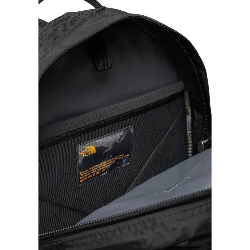 The north face men borealis classic black nylon backpack interior showing branded orange label and logo