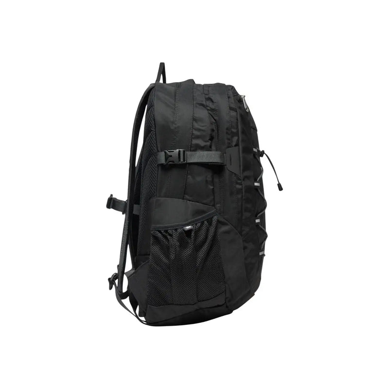 The north face men borealis classic black nylon backpack with mesh side pocket and adjustable straps shown from the back side